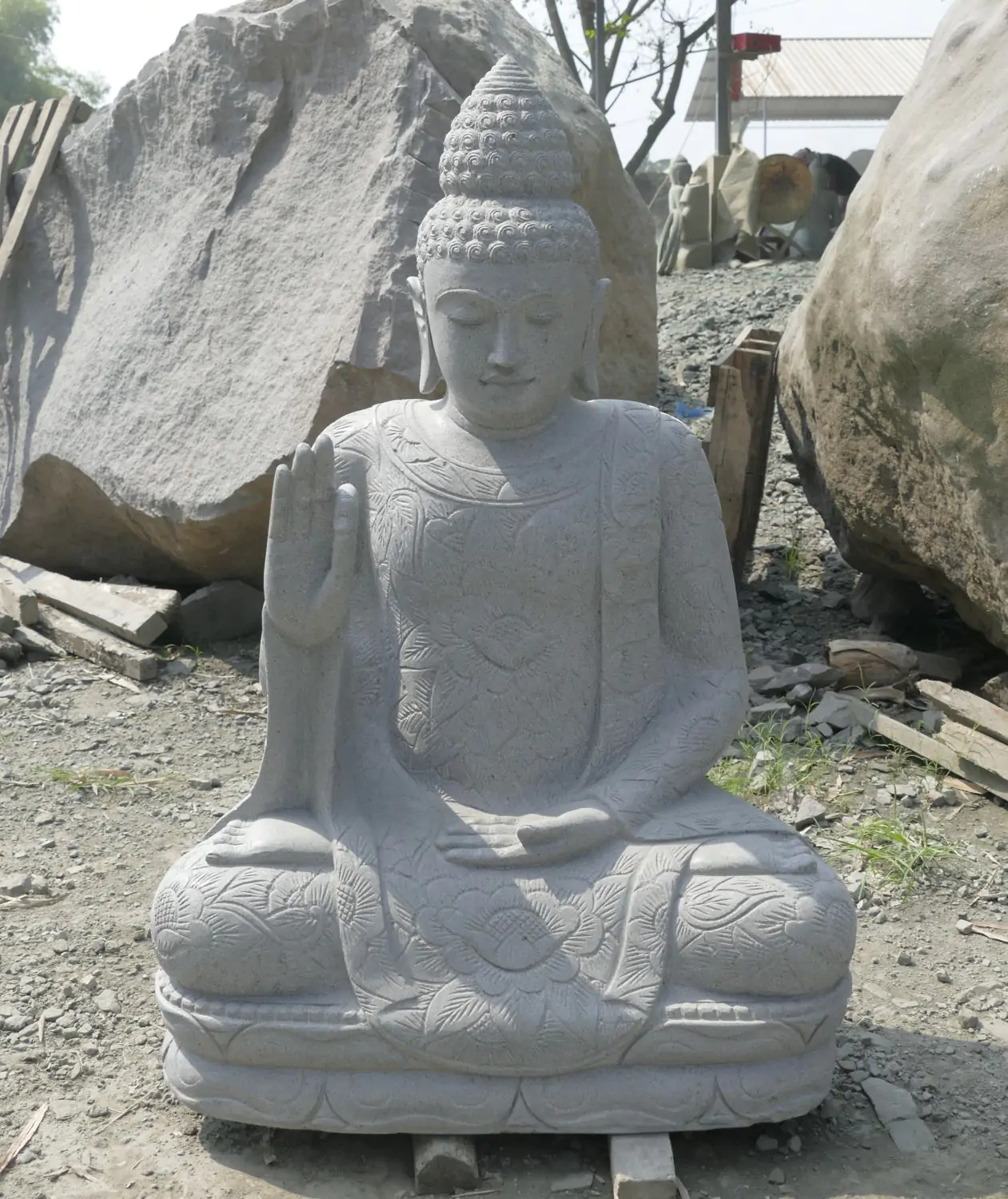  Product image 2 of the product “Seated Buddha with floral carving - Abhaya position. About 121 cm height. Natural stone (river stone), stonemasonry ”